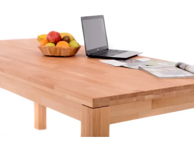Стол Гравис натурального цвета, материал - срощенный бук (вид с угла).